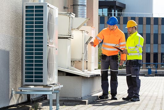 Electrician Men Checking Air Conditioning Unit
